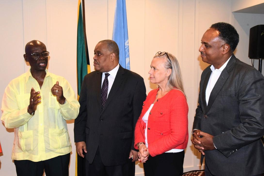 Minister of Local Government and Rural Development, Desmond McKenzie in conversation with UN Resident Coordinator, Dr Garry Conille, EU Ambassador to Jamaica, Marianne Van Steen and Managing Director, Jamaica Social Investment Fund, Omar Sweeney at the launch of the joint programme aimed at strengthening Jamaica’s resilience to food and water insecurity. 
