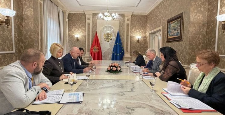 Officials sitting around a table