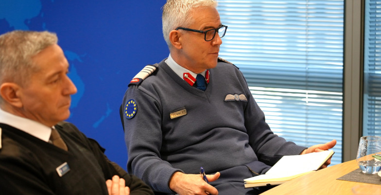 General Clancy (right) and another military officer in a conference.