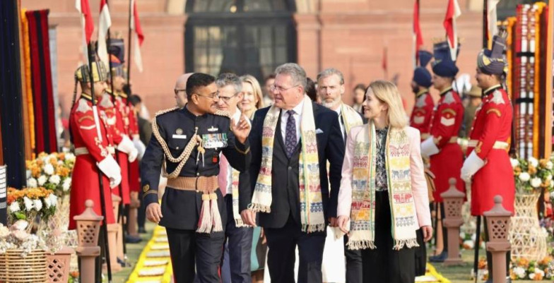 Three dignitaries walking in New Delhi
