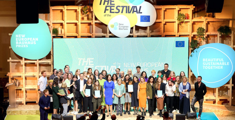 A family photo of prizewinners on stage at the NEB festival. 