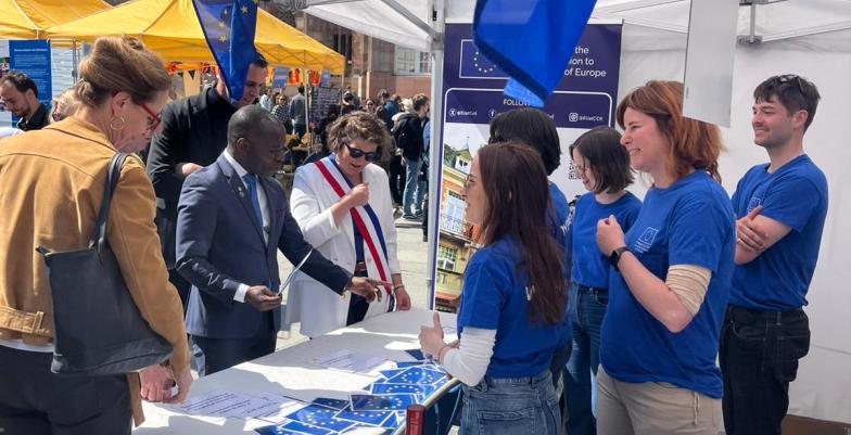 People visiting the stand