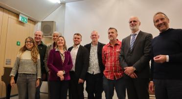 A picture of a group of people smiling