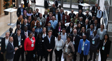 Researchers at a meeting at Strathmore