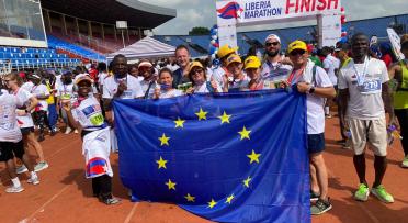 Group of people showing the EU flag