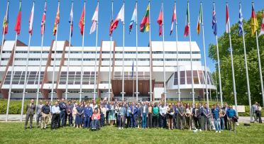 People gathered on the Council of Europe's field to celebrate the launch of "Sport for All" project