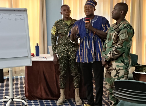 Participants and civilian representatives presenting the results of the discussion from the workshop