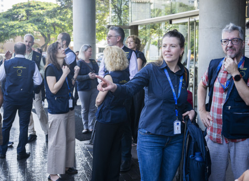 observers in front of their hotel before the deployment