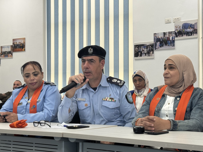 Man in uniform talking during the Orange Coffee Morning event