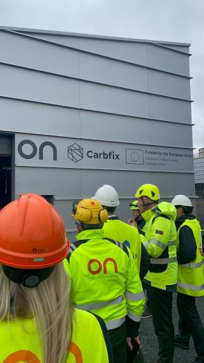 group of people in bright yellow jackets. 