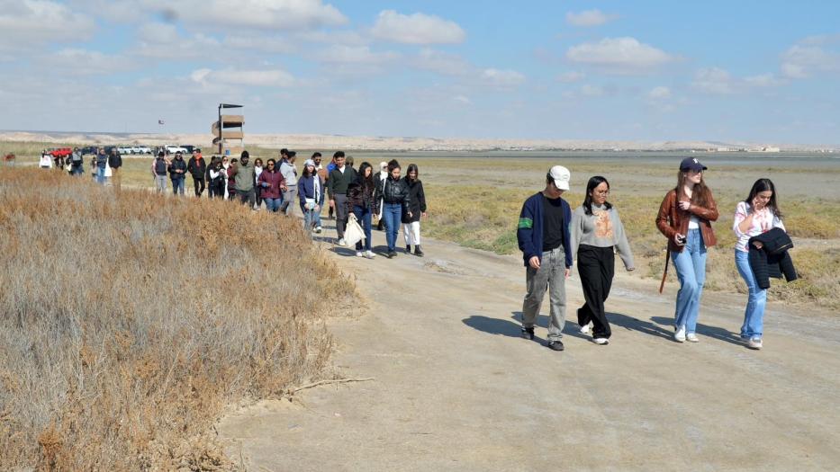 Young Ambassadors participating in a visit to the Jahra Natural Reserve