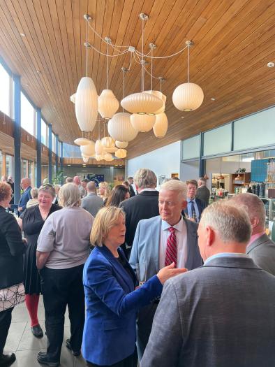 Lots of people attending a reception