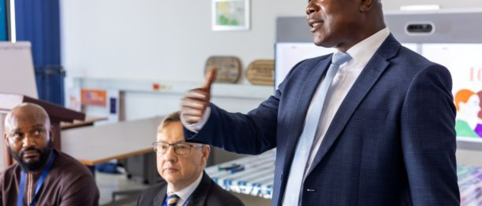 Dr Tarwallie of IDEA International speaking at the event