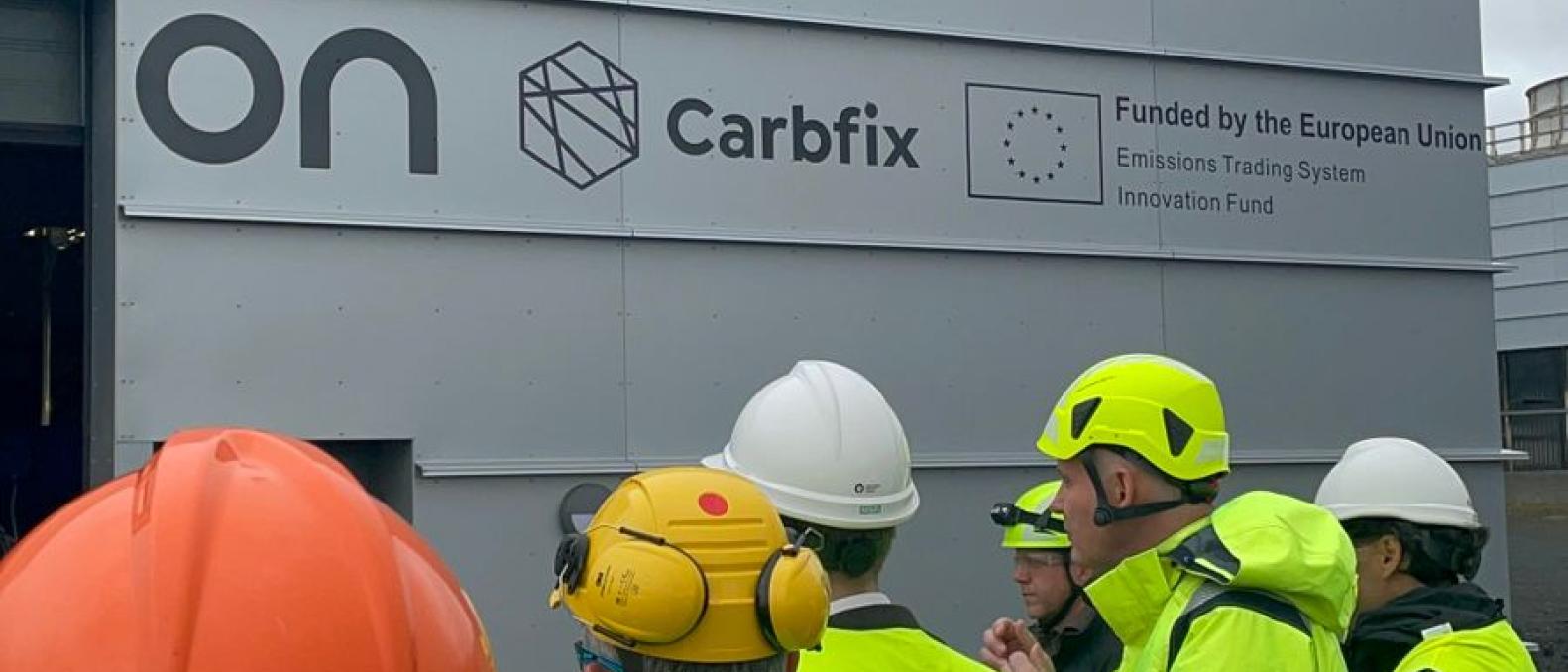 group of people in bright yellow jackets. 