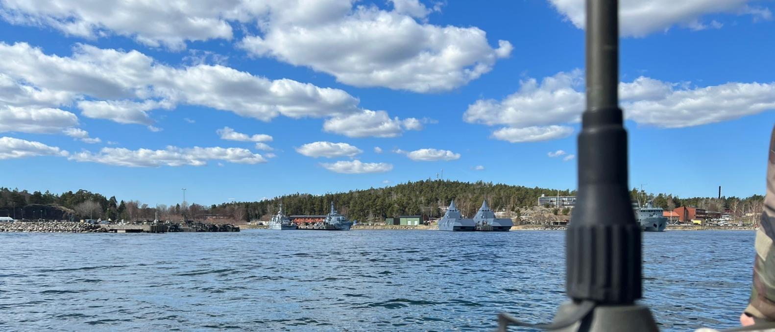 Some boats in a lake