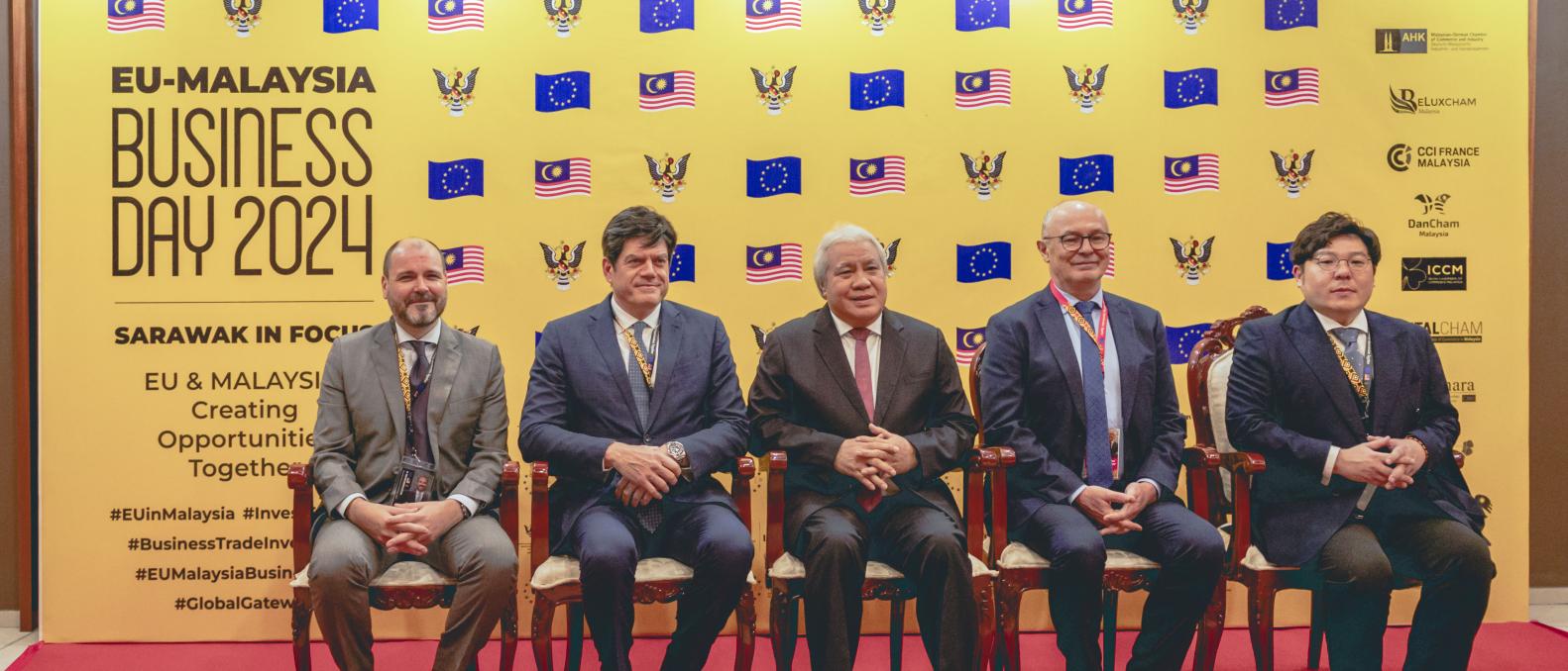 CEO Jordi Pol, Ambassador Rokas, DPM of Sarawak, Ambassador Van Acker and CEO Ong sitting in front of the EU-Malaysia Business Day bannes
