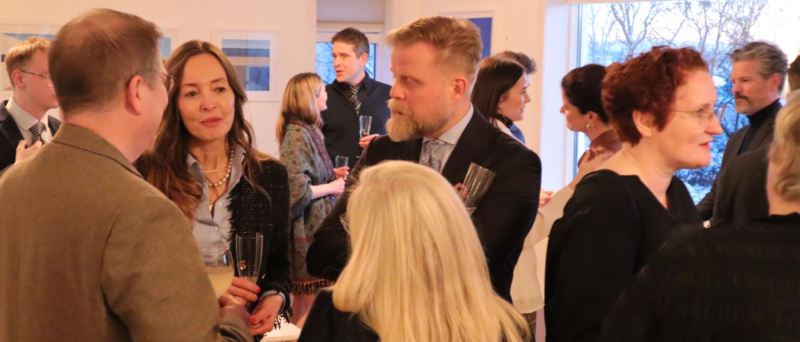 picture of various guests interacting with one another