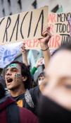 Picture of young activists calling out for the respect of democracy