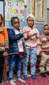Sudanese refugee children resume their education in a community learning centre in Egypt, supported 