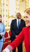 Foreground, Keir Starmer, UK PM, meets and greets HRVP Kaja Kallas, other dignitaries in background.