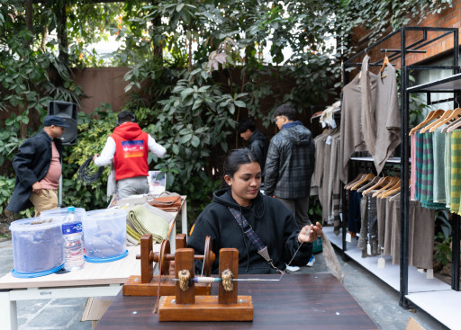 Pashmina artisan hand-spins pashmina fibre.