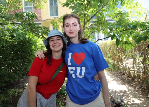 Two girls pose for the camera.