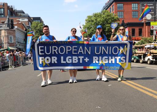 People holding a banner that says "European Union Supports LGBT+ Rights"