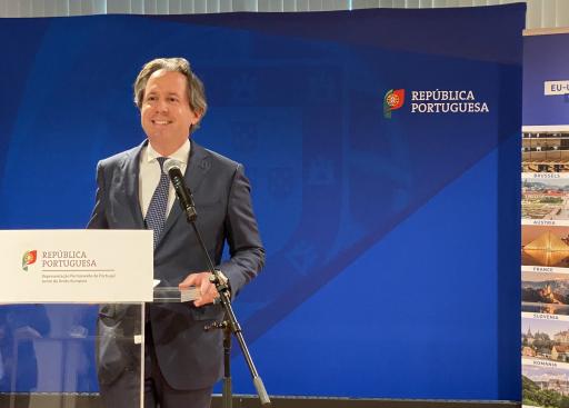 Man talking into a lectern