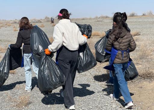Volunteers team collecting waste