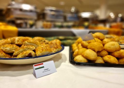 Samosas on the left and round pieces of dough on the right