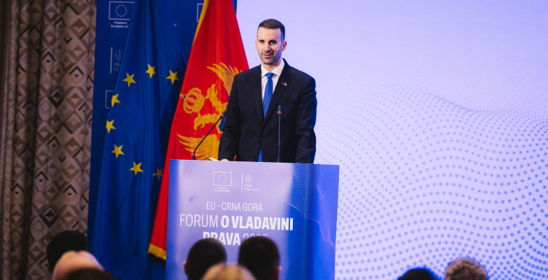Prime Minister Spajić standing behind the lectern