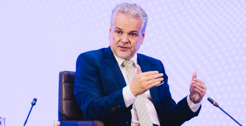 Ambassador Sattler sitting