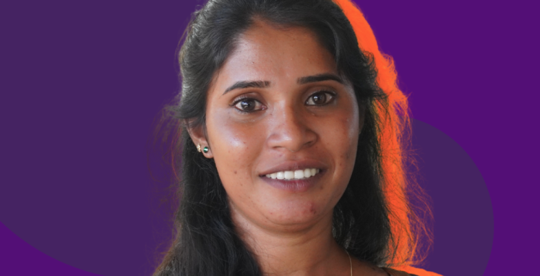 Surangi poses for a picture with her quote 