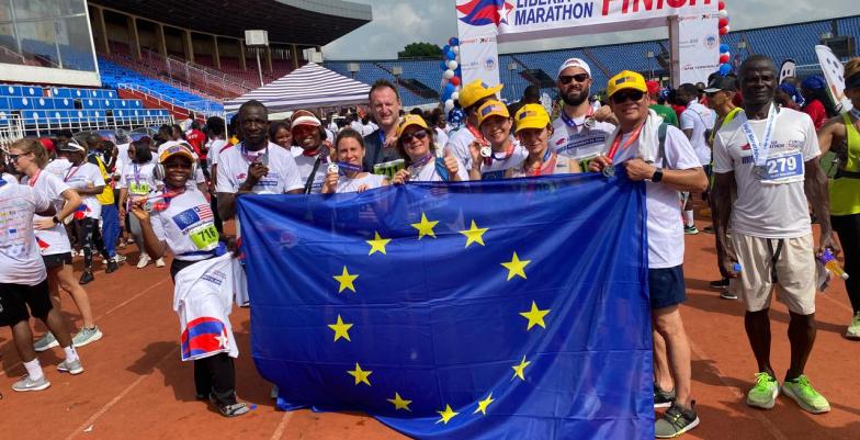 Group of people showing the EU flag