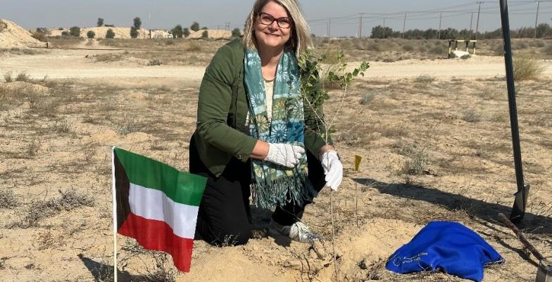 EU Ambassador Anne Koistinen planting a tree on behalf of the EU Delegation at Al-Abdaliya reserve. 