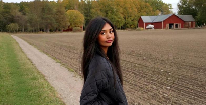 Amrita Naraine in a field
