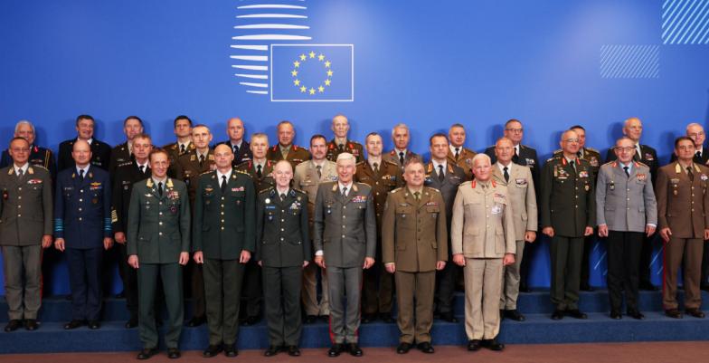 A group photo of 30 men in uniform, high ranking. 