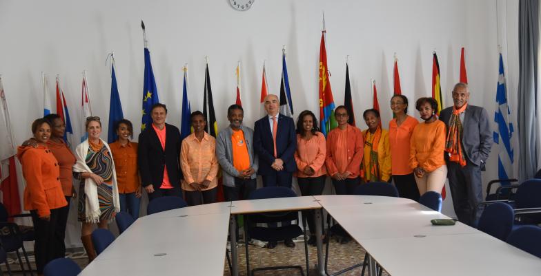 Group of people during the International Day to eliminate violence against Women & Girls