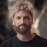 Young adult man with with blond hair and beard
