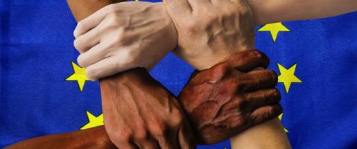 four hands together in a square
