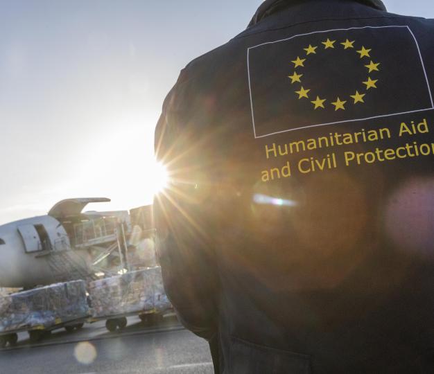 A member of the European Civil Protection and Humanitarian Aid Operations (ECHO) team watching the l