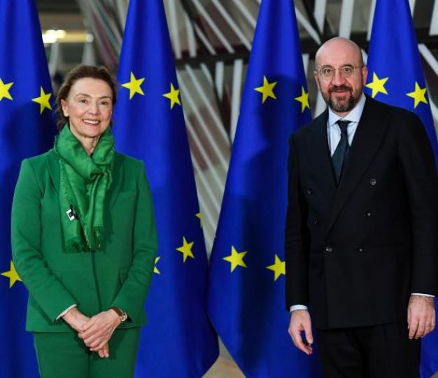 Close-up of Marija PEJČINOVIĆ BURIĆ (Secretary General of the Council of Europe) and Charles MICHEL (President of the European Council) in front of a blue background