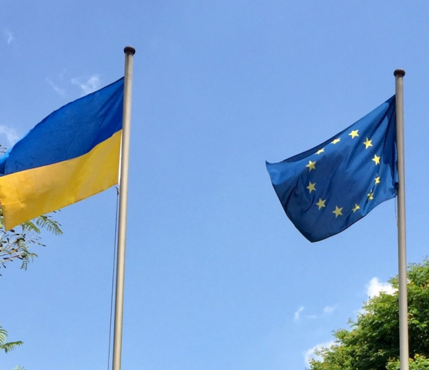 Eu and Ukraine waving flag