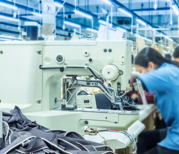 Asian women working with sewing machines