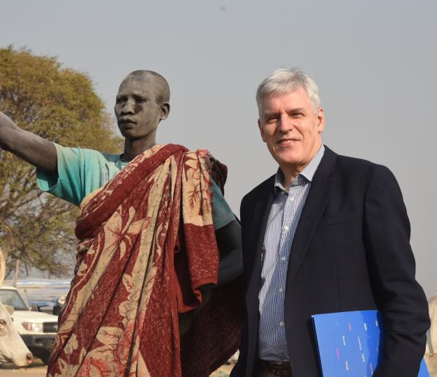 Ambassador Christian Bader with a herdsman during an EU co-funded livestock vaccination exercise.