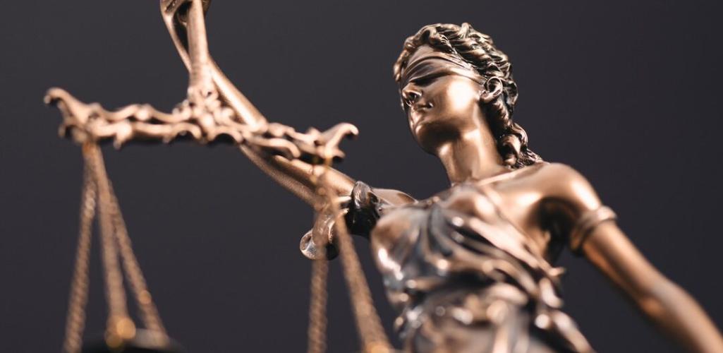 A close up of Lady Justice statue. 